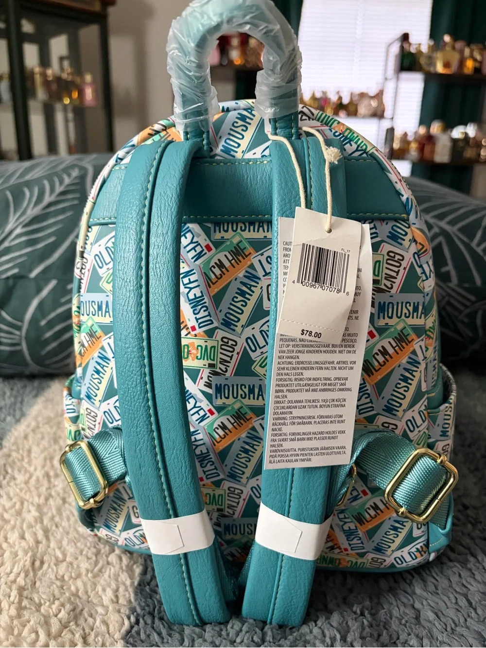 Disney Teal Orange Patterned Mini Backpack by Loungefly